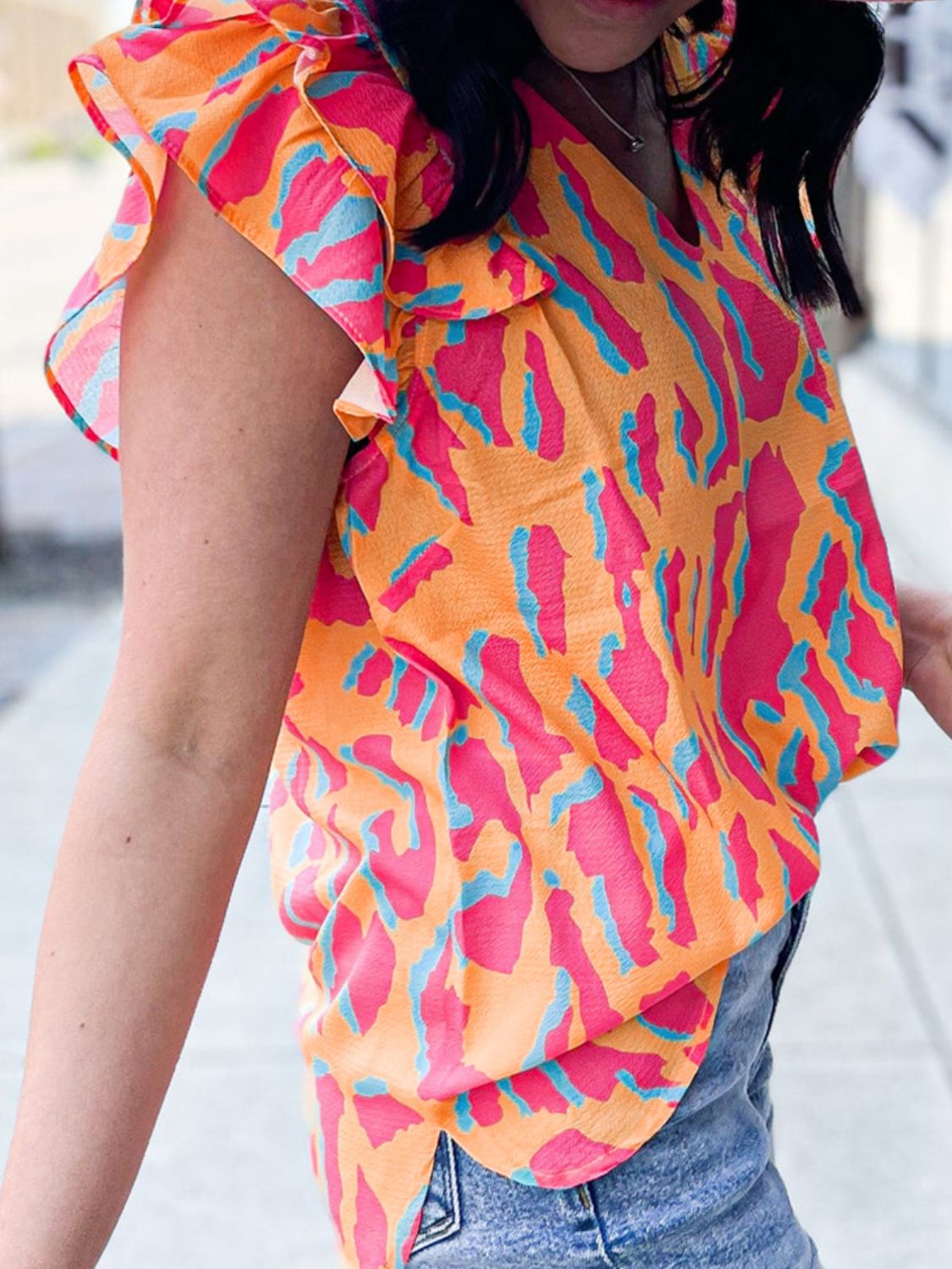 Ruffled Printed V-Neck Cap Sleeve Blouse